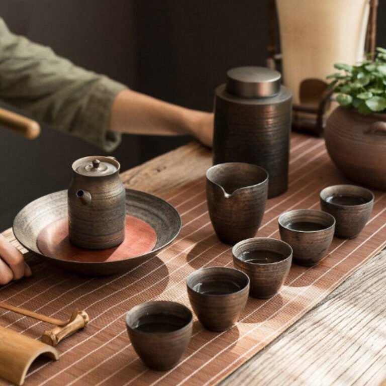 Chinese Ceramic Tea Sets: tea canister, tea cups, tea pitcher.